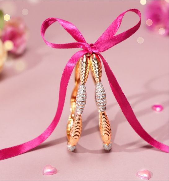 Stylish gold bangles with diamond accents tied with ribbon for women
